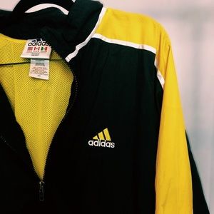 Vintage black and yellow Adidas windbreaker jacket